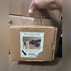 Brand New in box Beautiful Set of Pier 1 Carved Dark Wood Brackets for Rods
